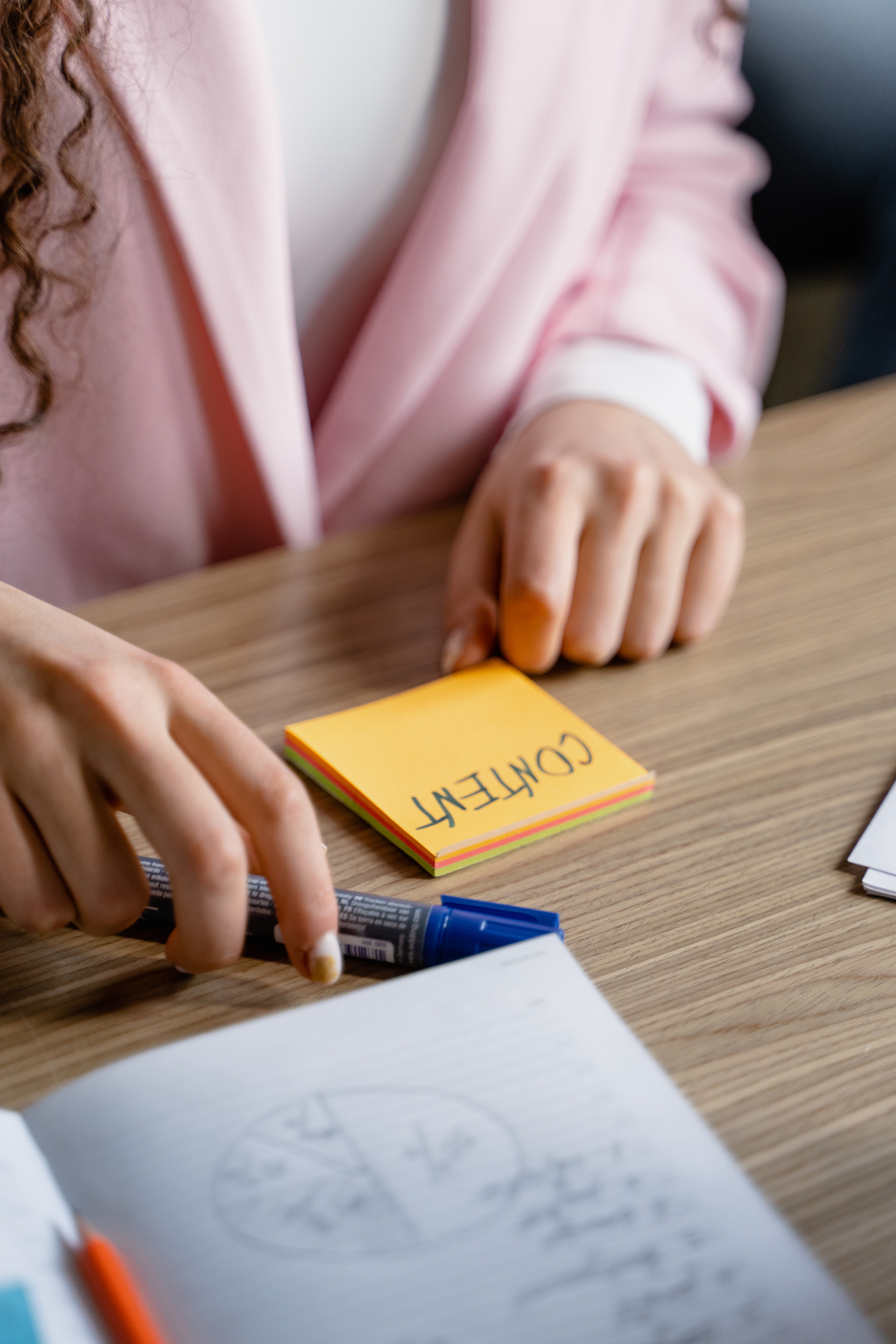 Woman Working on Content on Office Desk